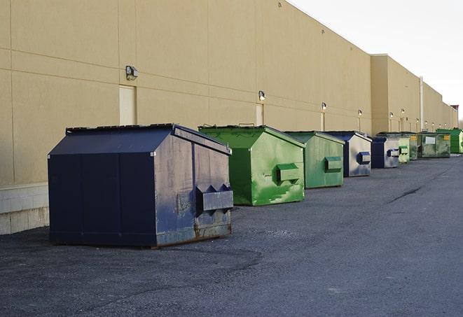 a large metal bin for waste disposal on the construction site in Coppell